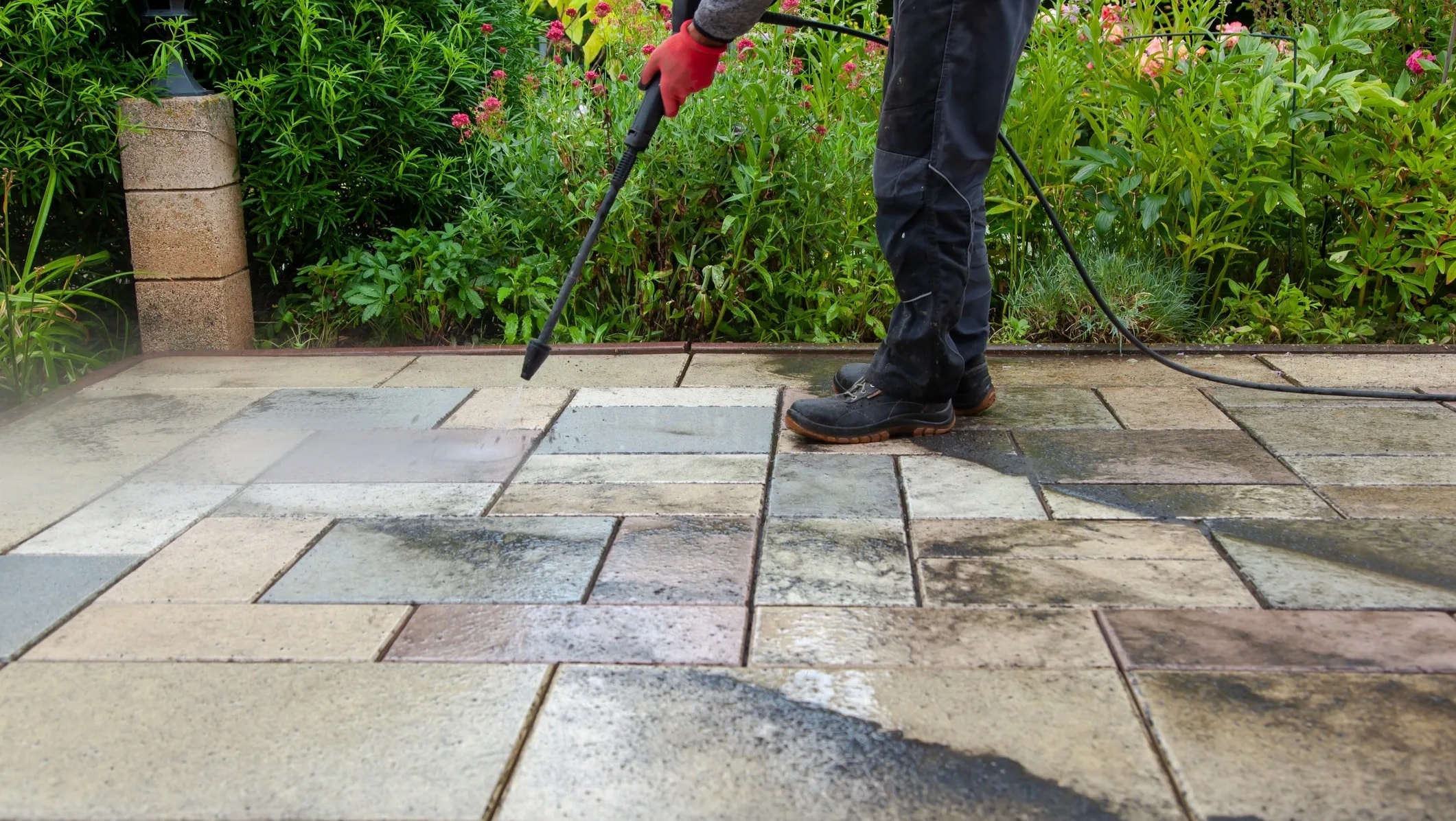 Professional pressure washing service on a commercial building exterior in Perth