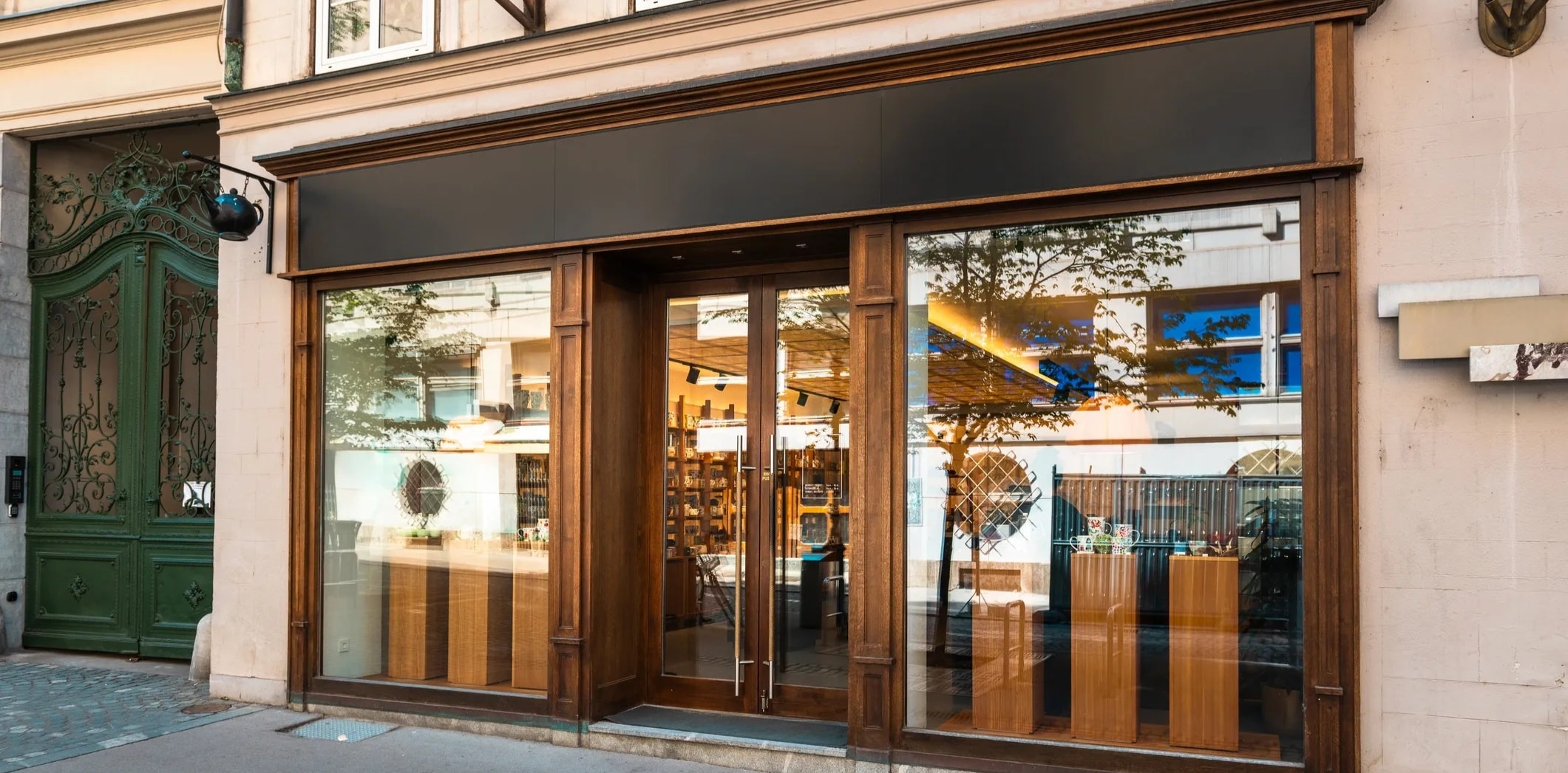 Professional window cleaning service on a commercial shopfront in Perth