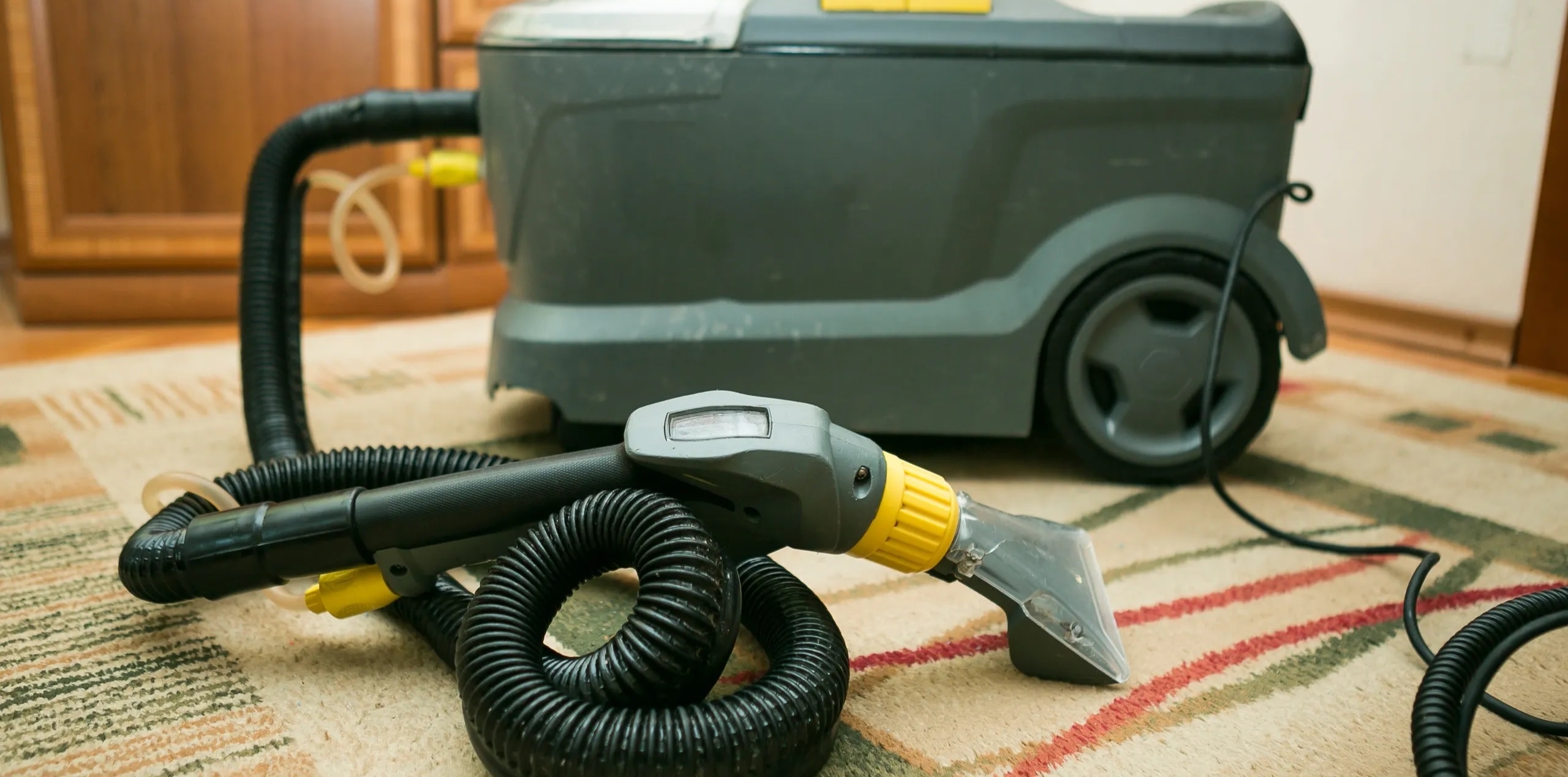 Carpet cleaning equipment ready for use during a professional carpet cleaning service in Perth
